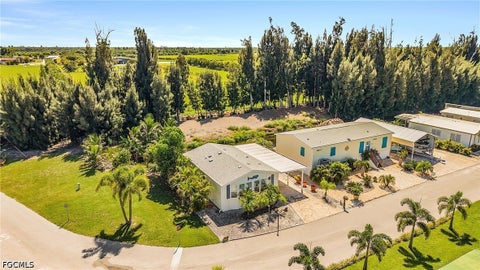 Photo of 7334 Drum Drive, St James City, FL 33956 (MLS # 2026038740)