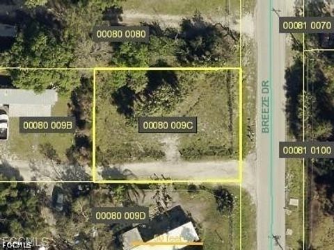 Photo of 7598 Breeze Drive, North Fort Myers, FL 33917 (MLS # 2026020420)