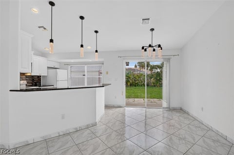 Tiny photo for 827 SW 29th Terrace, Cape Coral, FL 33914 (MLS # 2026026772)