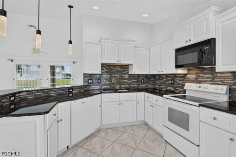 Photo of 827 SW 29th Terrace, Cape Coral, FL 33914 (MLS # 2026026772)