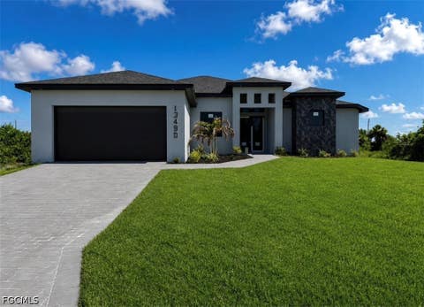 Photo of 13490 Los Angeles Avenue, Port Charlotte, FL 33981 (MLS # 2026028737)