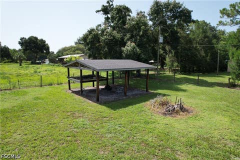 Tiny photo for 21680 N River Road, Alva, FL 33920 (MLS # 2026030615)