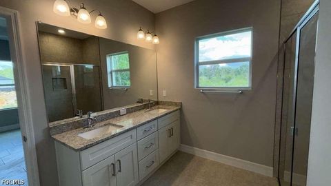 Tiny photo for 460 Westchester Drive, Lehigh Acres, FL 33972 (MLS # 2026023104)