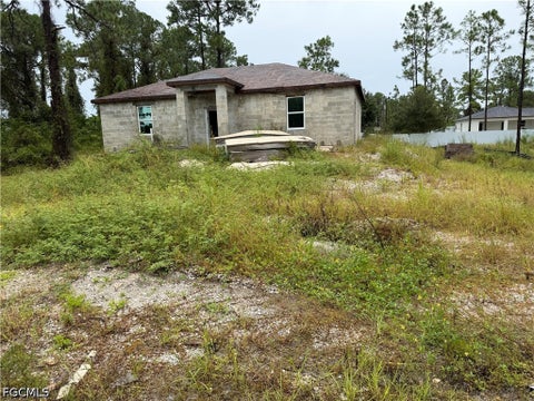 Photo of 857 Adler Street E, Lehigh Acres, FL 33974 (MLS # 2026041872)