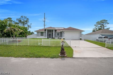 Photo of 60 Floyd Avenue S, Lehigh Acres, FL 33976 (MLS # 2026023591)