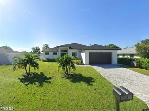 Photo of 920 SE 15th Terrace, Cape Coral, FL 33990 (MLS # 2026031207)