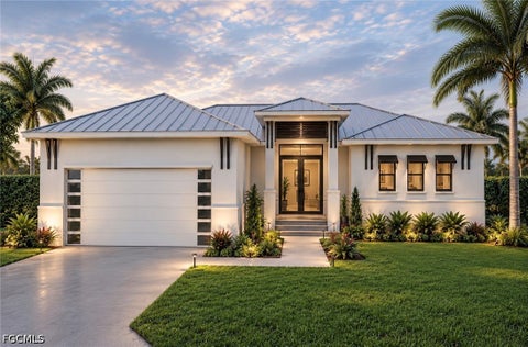 Photo of 1908 Jackson Avenue, Lehigh Acres, FL 33972 (MLS # 2026040261)