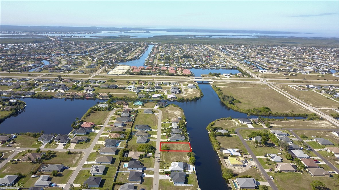 Aerial view of property and surrounding area featu