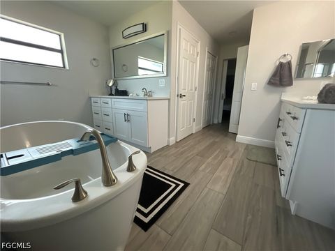 Tiny photo for 1008 NW 12th Avenue, Cape Coral, FL 33993 (MLS # 2026020085)