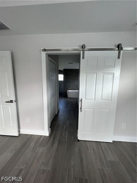 Tiny photo for 1008 NW 12th Avenue, Cape Coral, FL 33993 (MLS # 2026020085)