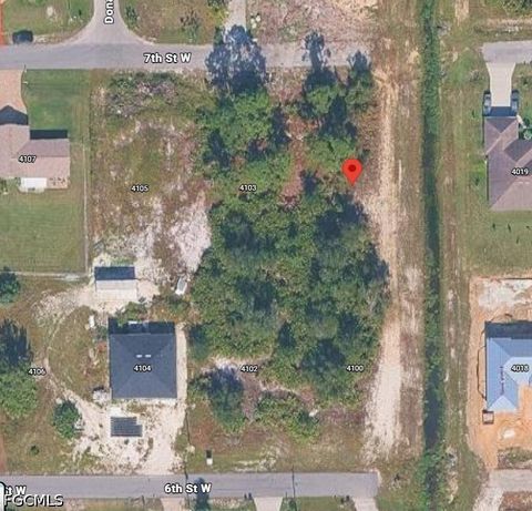 Photo of 4101 7th Street W, Lehigh Acres, FL 33971 (MLS # 2026020251)
