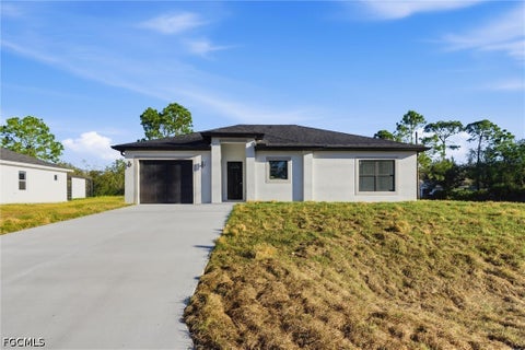 Photo of 107 E 15th Street, Lehigh Acres, FL 33972 (MLS # 2026041382)