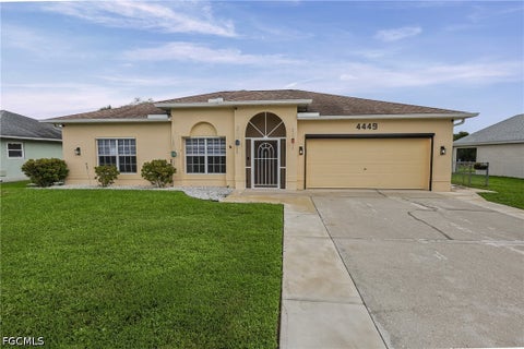 Photo of 4449 Varsity Lakes Drive, Lehigh Acres, FL 33971 (MLS # 2026039991)