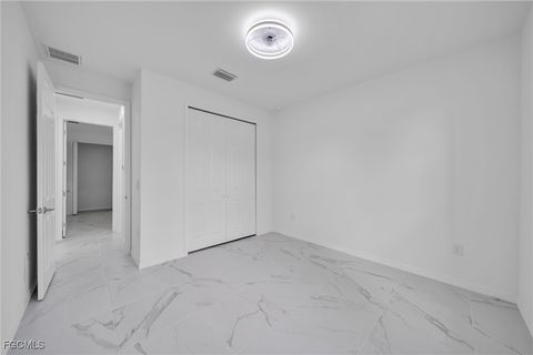 Tiny photo for 312 Harrison Drive, Lehigh Acres, FL 33936 (MLS # 2026005131)