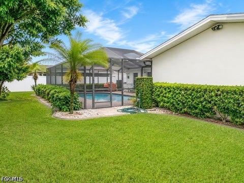 Tiny photo for 1220 SE 22nd Street, Cape Coral, FL 33990 (MLS # 2026030307)