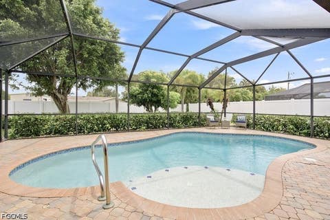Tiny photo for 1220 SE 22nd Street, Cape Coral, FL 33990 (MLS # 2026030307)