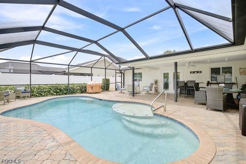 Tiny photo for 1220 SE 22nd Street, Cape Coral, FL 33990 (MLS # 2026030307)