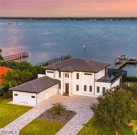 Photo of 6390 River Club Court, North Fort Myers, FL 33917 (MLS # 2026031142)