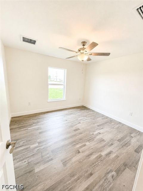 Tiny photo for 233 NW 22nd Place, Cape Coral, FL 33993 (MLS # 2026022490)