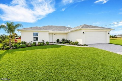 Photo of 233 NW 22nd Place, Cape Coral, FL 33993 (MLS # 2026022490)