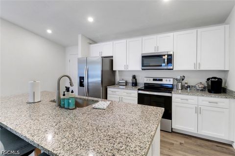 Tiny photo for 233 NW 22nd Place, Cape Coral, FL 33993 (MLS # 2026022490)