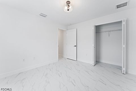 Tiny photo for 1042 Cheney Avenue S, Lehigh Acres, FL 33974 (MLS # 2026015285)