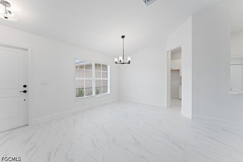 Tiny photo for 1042 Cheney Avenue S, Lehigh Acres, FL 33974 (MLS # 2026015285)