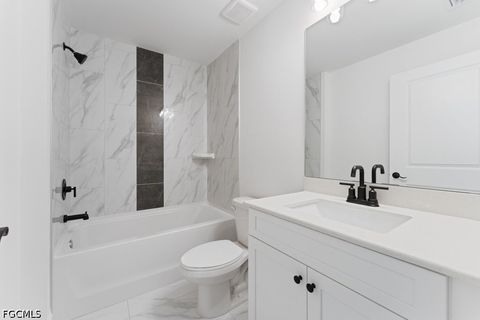 Tiny photo for 1042 Cheney Avenue S, Lehigh Acres, FL 33974 (MLS # 2026015285)