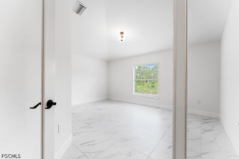 Tiny photo for 1042 Cheney Avenue S, Lehigh Acres, FL 33974 (MLS # 2026015285)