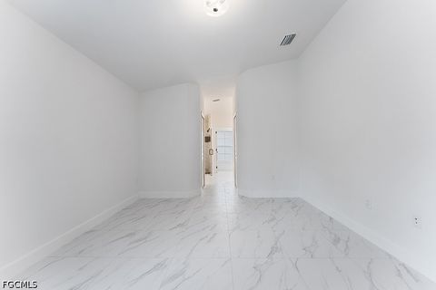 Tiny photo for 1042 Cheney Avenue S, Lehigh Acres, FL 33974 (MLS # 2026015285)