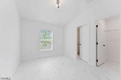 Tiny photo for 1042 Cheney Avenue S, Lehigh Acres, FL 33974 (MLS # 2026015285)