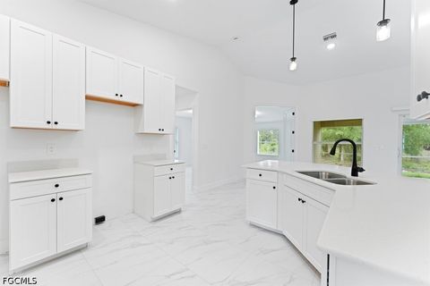 Tiny photo for 1042 Cheney Avenue S, Lehigh Acres, FL 33974 (MLS # 2026015285)