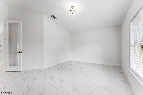 Tiny photo for 1042 Cheney Avenue S, Lehigh Acres, FL 33974 (MLS # 2026015285)