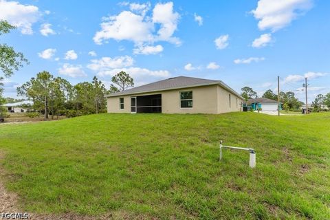 Tiny photo for 1042 Cheney Avenue S, Lehigh Acres, FL 33974 (MLS # 2026015285)