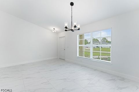 Tiny photo for 1042 Cheney Avenue S, Lehigh Acres, FL 33974 (MLS # 2026015285)