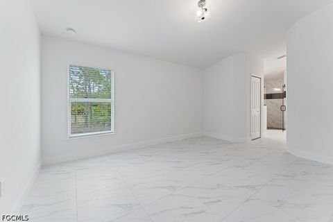 Tiny photo for 1042 Cheney Avenue S, Lehigh Acres, FL 33974 (MLS # 2026015285)