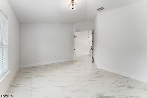 Tiny photo for 1042 Cheney Avenue S, Lehigh Acres, FL 33974 (MLS # 2026015285)