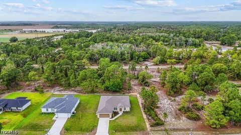 Tiny photo for 1042 Cheney Avenue S, Lehigh Acres, FL 33974 (MLS # 2026015285)