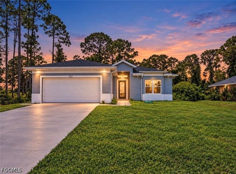 Photo of 222 Corvet Avenue S, Lehigh Acres, FL 33974 (MLS # 2026038649)