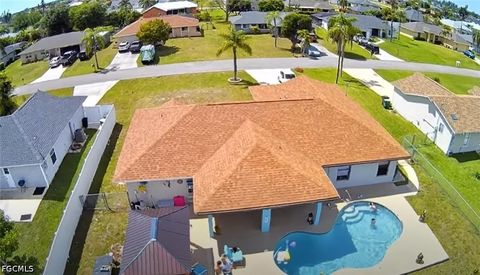 Photo of 1319 SW 10th Place, Cape Coral, FL 33991 (MLS # 2026020244)