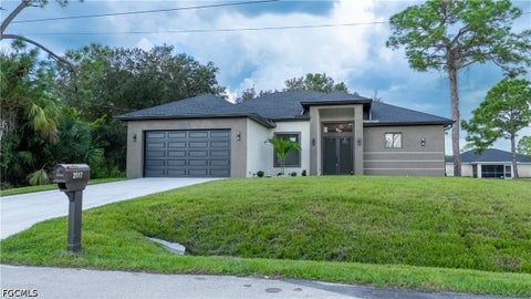 Photo of 2517 39th Street W, Lehigh Acres, FL 33971 (MLS # 2026042358)