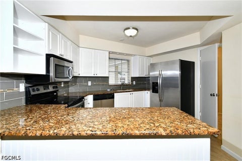 Tiny photo for 9 Park Lane Circle, Lehigh Acres, FL 33936 (MLS # 2026022817)