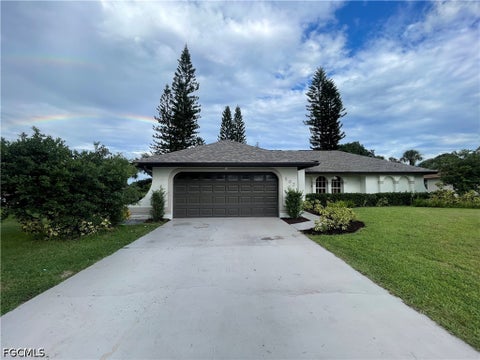 Photo of 502 Elaine Avenue N, Lehigh Acres, FL 33971 (MLS # 2026039810)