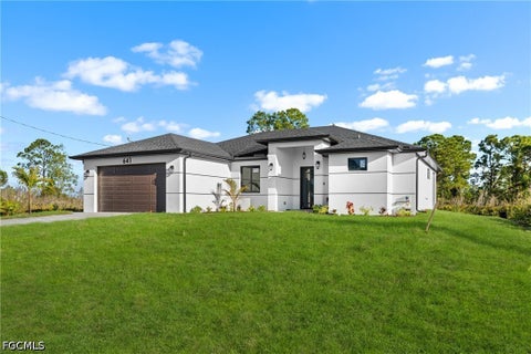 Photo of 641 Camilla Street E, Lehigh Acres, FL 33974 (MLS # 2026038014)