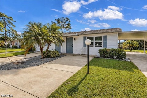 Tiny photo for 30 Desert Candle Circle, Lehigh Acres, FL 33936 (MLS # 2026039420)