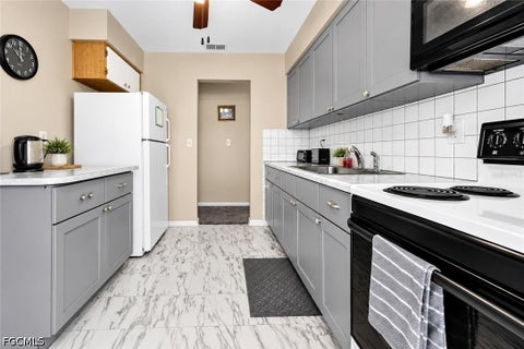 Tiny photo for 30 Desert Candle Circle, Lehigh Acres, FL 33936 (MLS # 2026039420)
