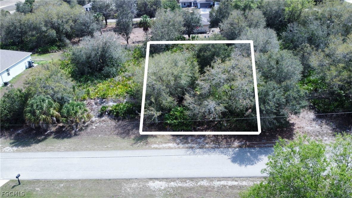 Aerial view of property's location with property b