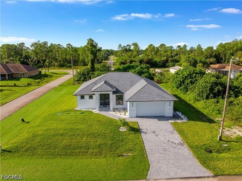 Photo of 736 Chambers Street E, Lehigh Acres, FL 33974 (MLS # 2026039160)