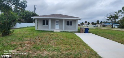 Photo 1 of 17 — 802 E Jasmine Road, Lehigh Acres, FL 33936