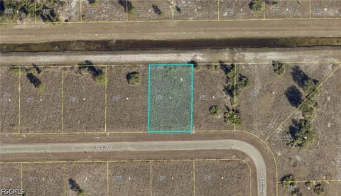 Photo of 1117 Easton Street E, Lehigh Acres, FL 33974 (MLS # 2026031527)